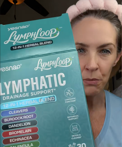 Customer holding Yesnap Lymphatic Support