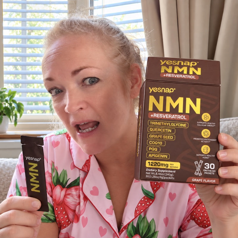 Person holding Yesnap NMN — cleaned from supplied photo