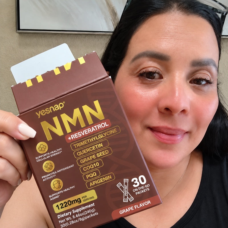 Person holding Yesnap NMN — cleaned from supplied photo